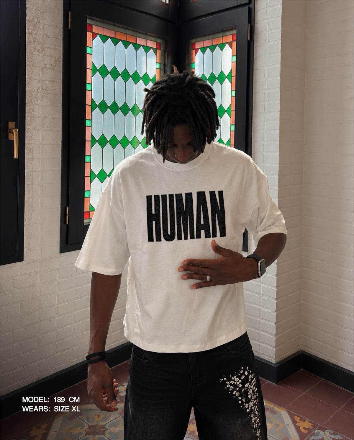 HUMAN TEE